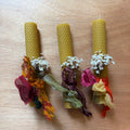 Beeswax candle with white bouquet