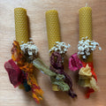 Beeswax candle with white bouquet