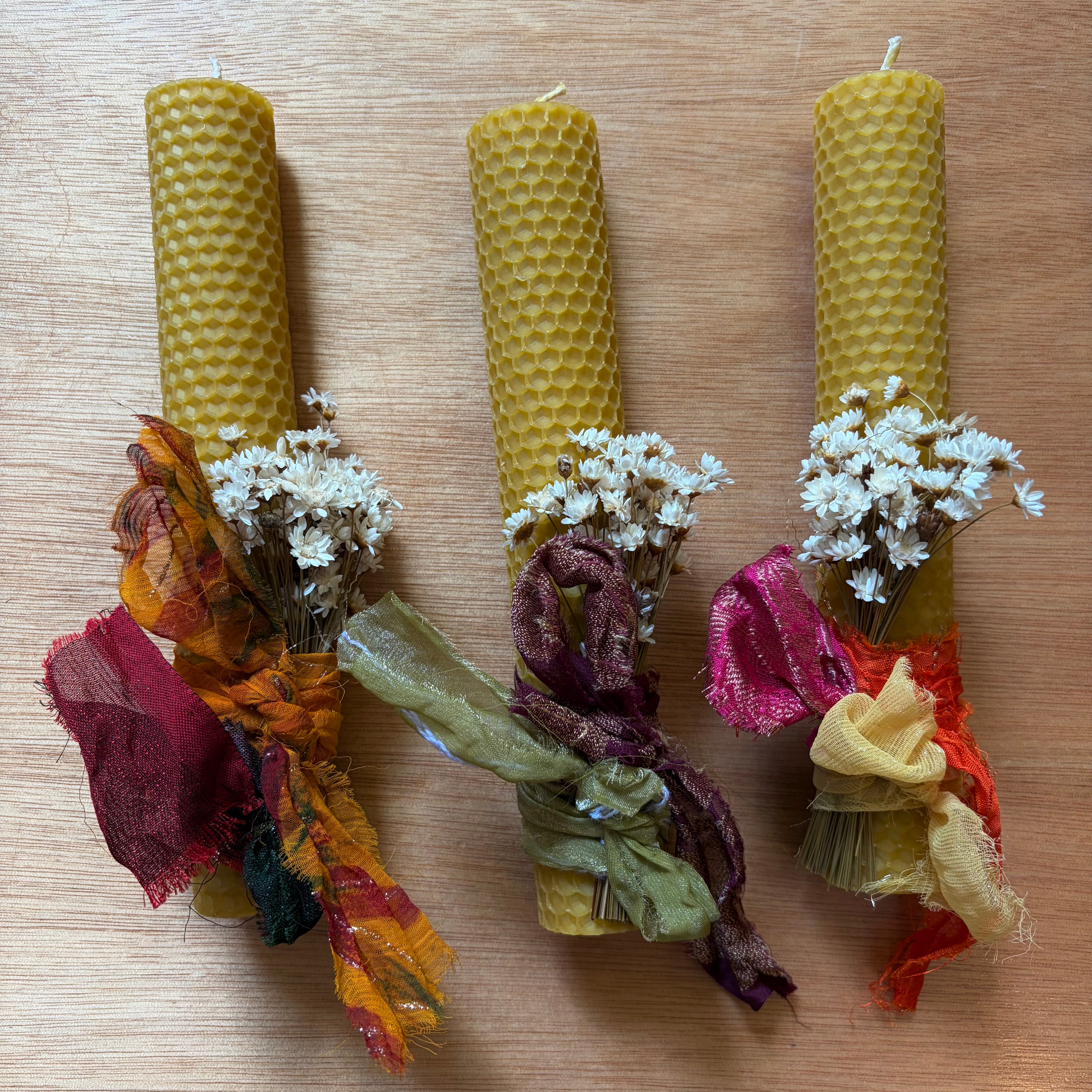 Beeswax candle with white bouquet