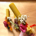 Beeswax candle with white bouquet