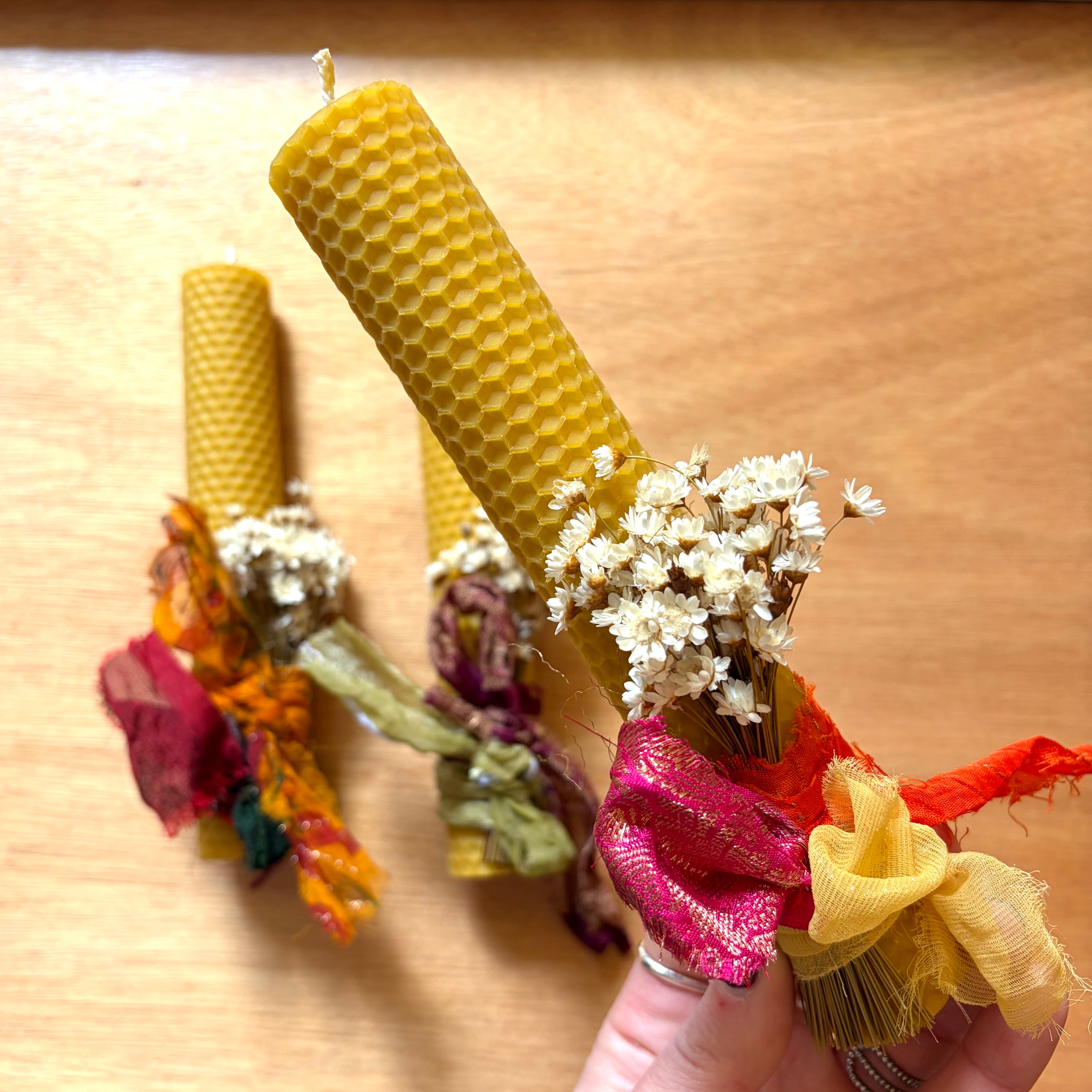Beeswax candle with white bouquet