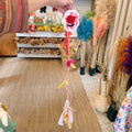 Spring garland with embroidered poppy