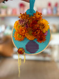 Dried Flowers in an Embroidered Vase