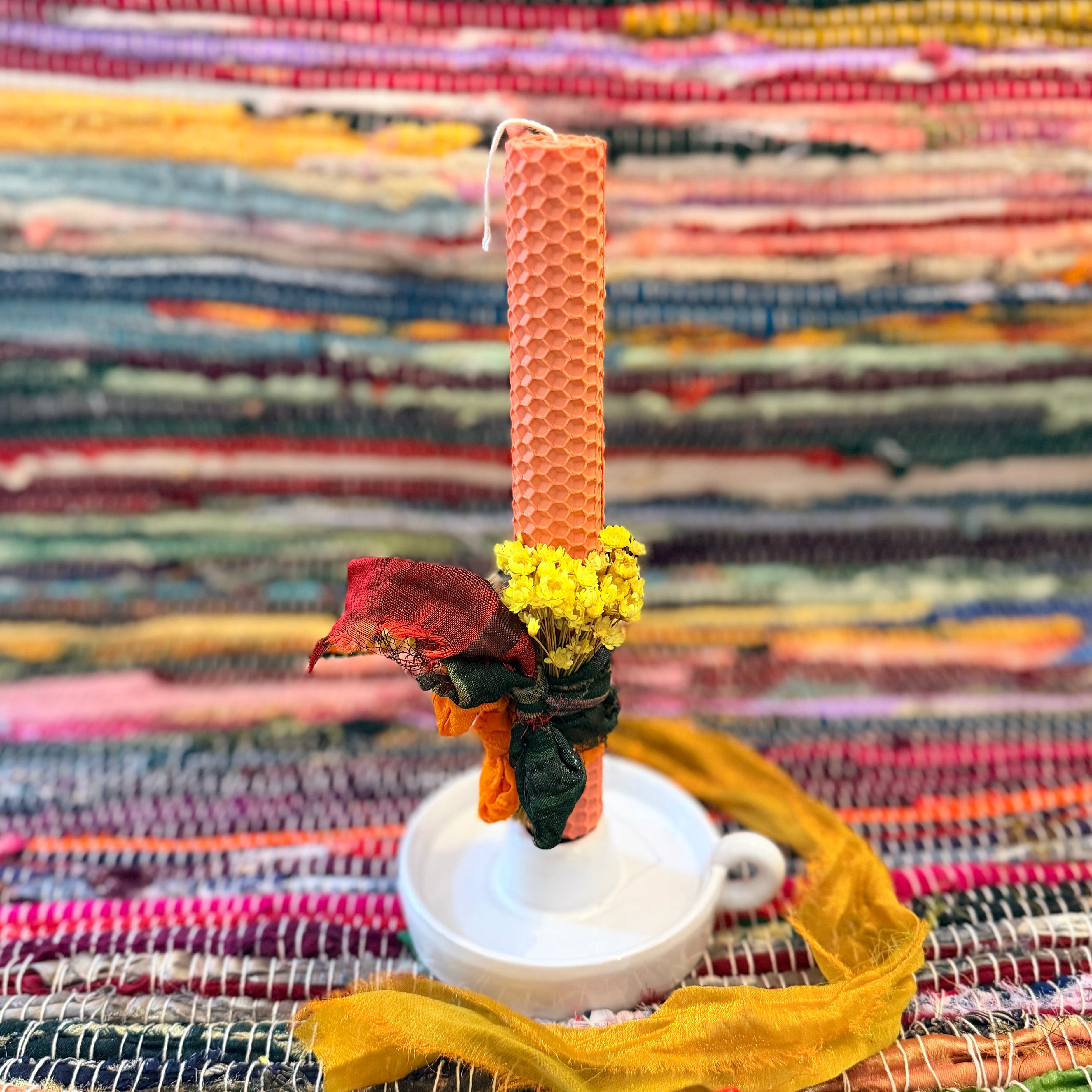 Beeswax candle with yellow bouquet