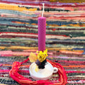 Beeswax candle with yellow bouquet
