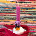Beeswax candle with lilac bouquet