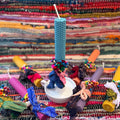 Beeswax candle with rainbow bouquet