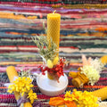 Beeswax candle with preserved hydrangea