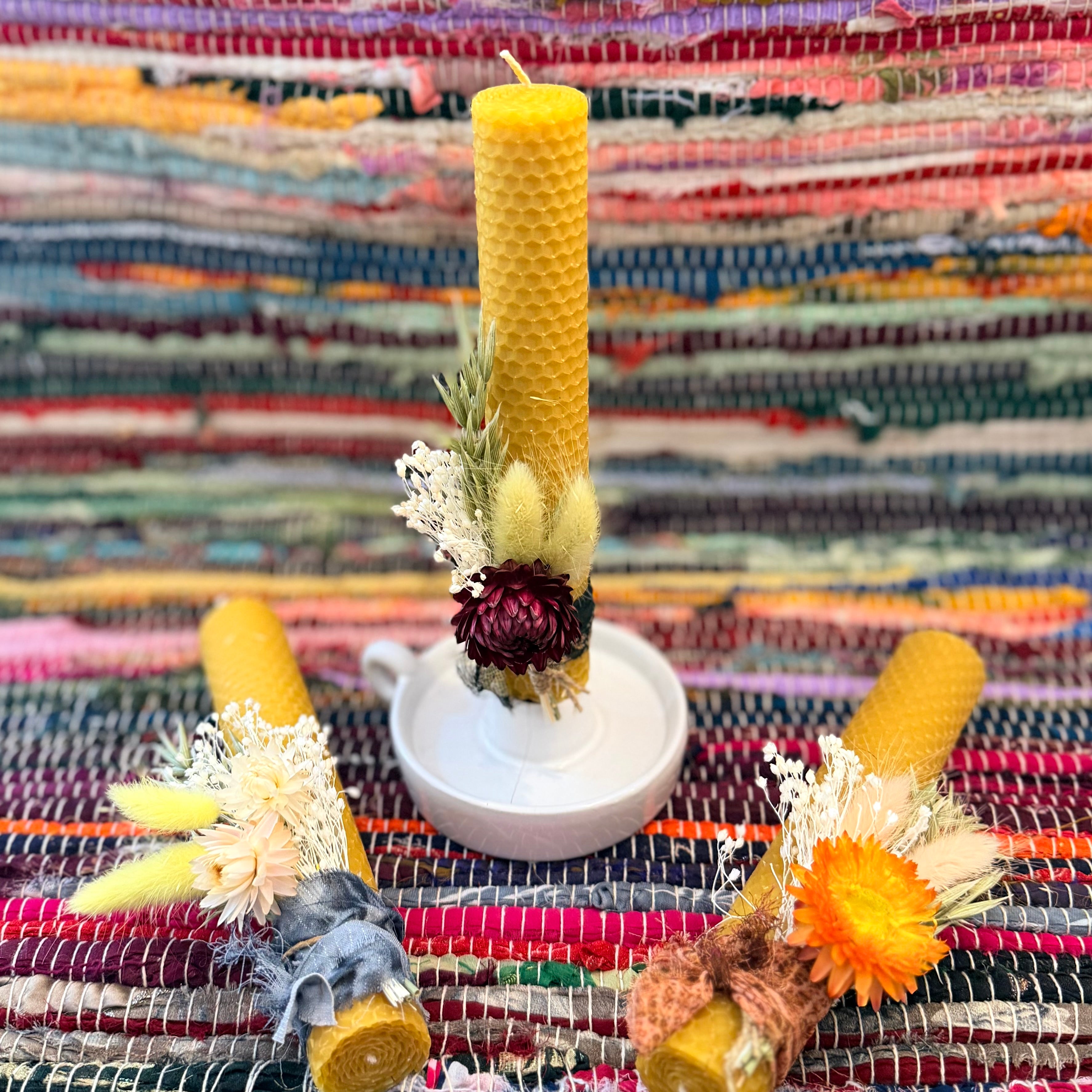 Beeswax candle with dried helichrysum