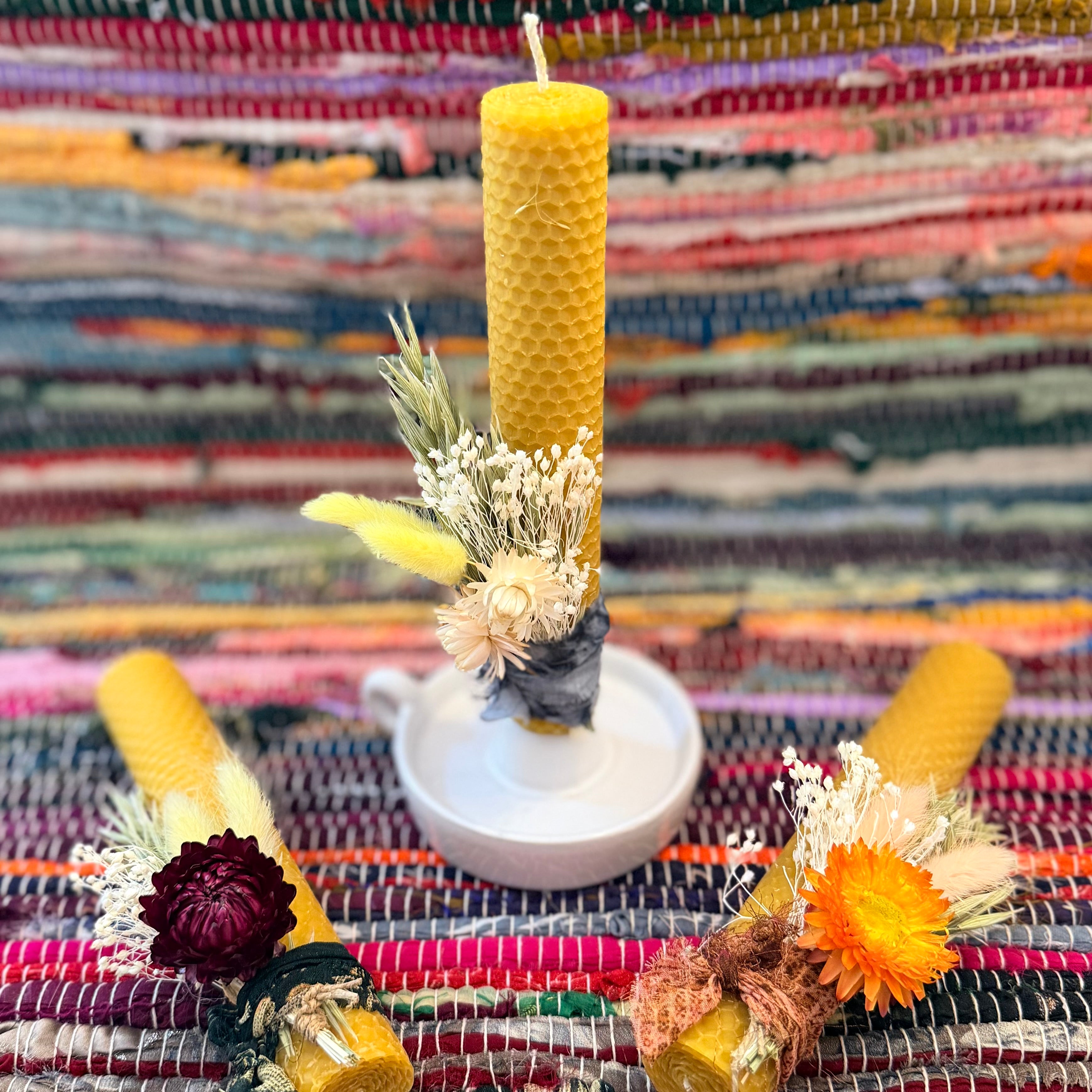 Beeswax candle with dried helichrysum