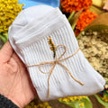 Socks with embroidered flower
