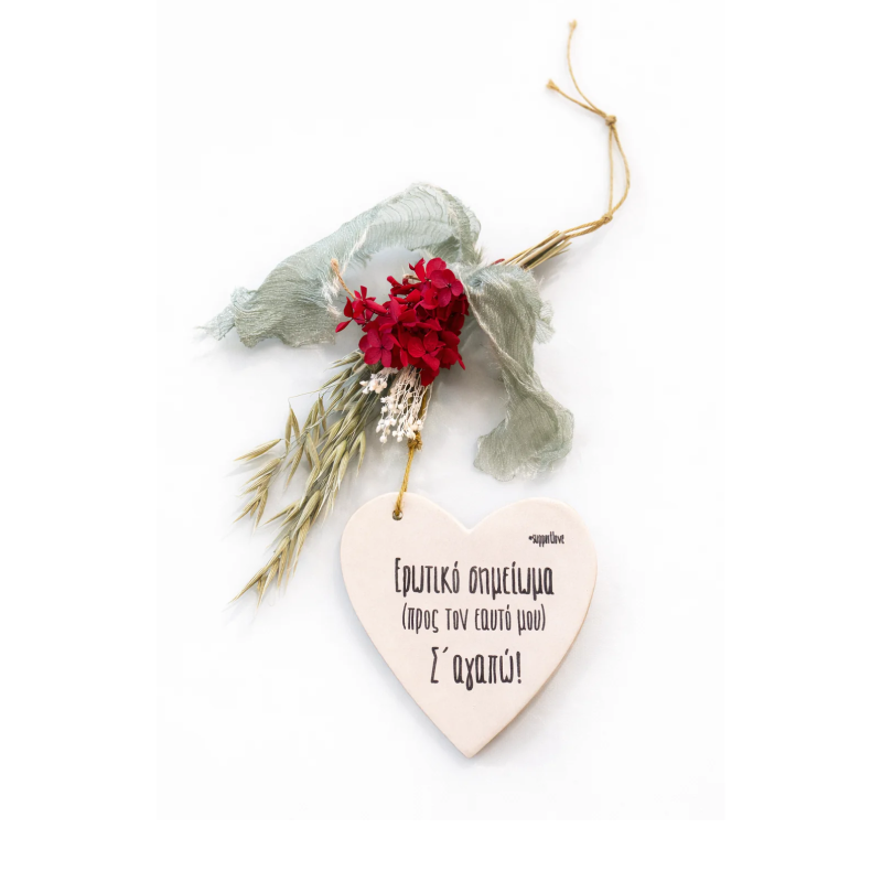 Ceramic hearts with quotes and dried bouquets