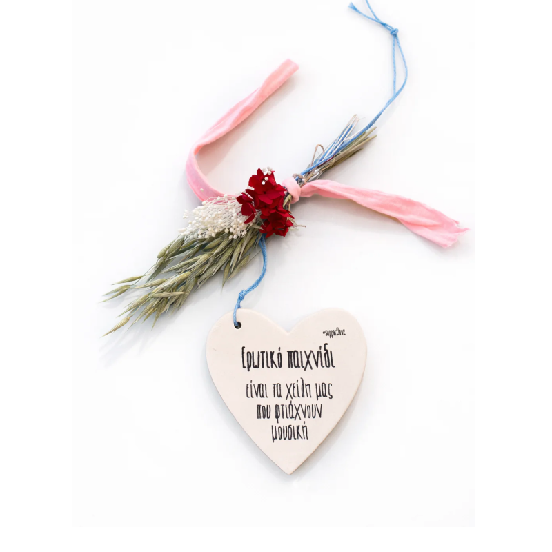 Ceramic hearts with quotes and dried bouquets