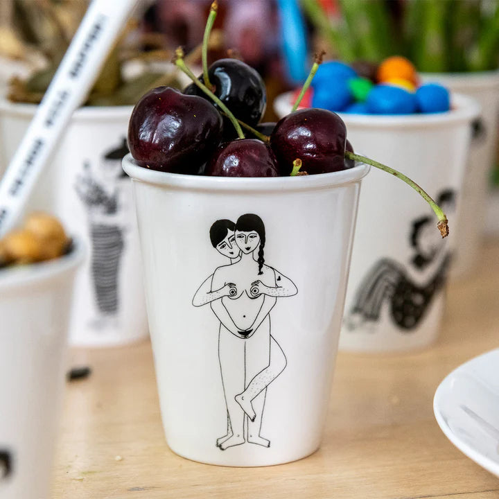 Faces everywhere cup